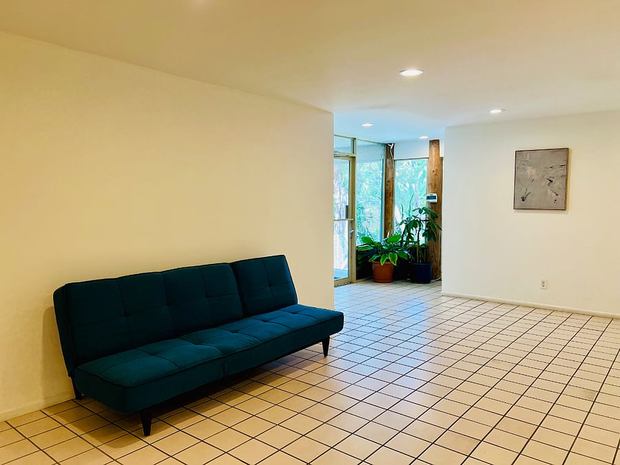 This is the foyer leading from the front door of the building to the front door of the unit.