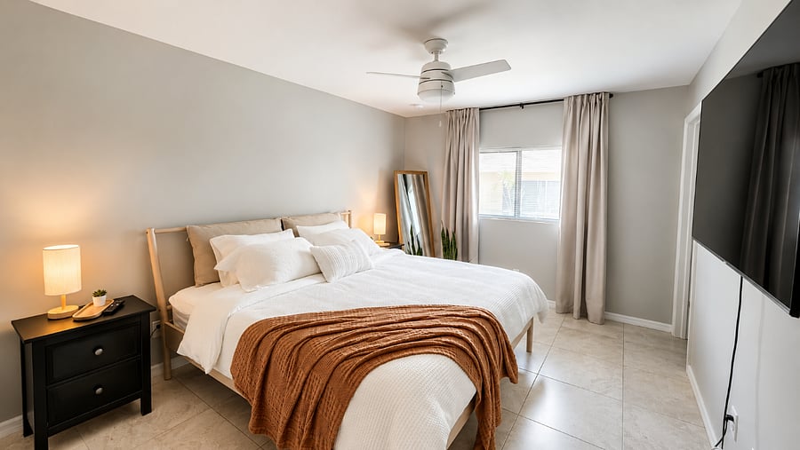 Relax in this cozy bedroom featuring a king-size bed, a memory foam mattress, and high-quality natural fabric bedding, creating a peaceful and comfortable space to recharge Releand unwind