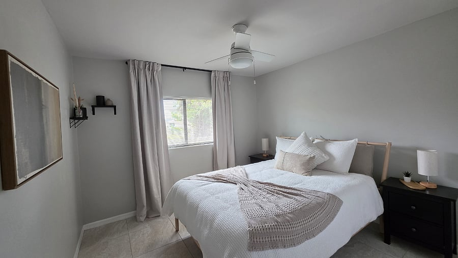 Relax in this cozy bedroom featuring a queen-size bed, a memory foam mattress, and high-quality natural fabric bedding, creating a peaceful and comfortable space to recharge and unwind