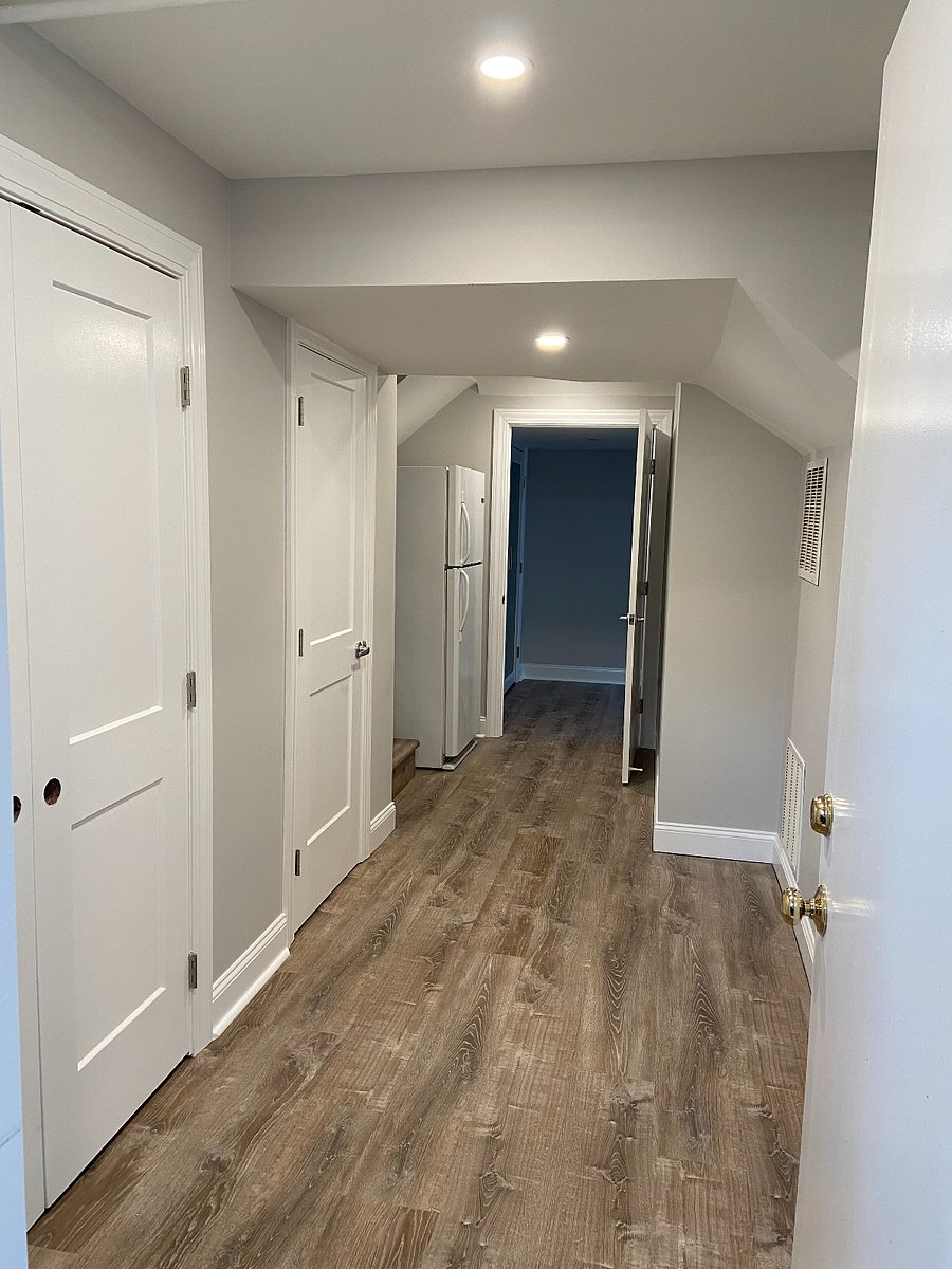 Lower level hallway from laundry towards bedroom 