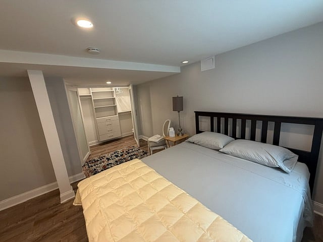 Lower level bedroom with California Closets System