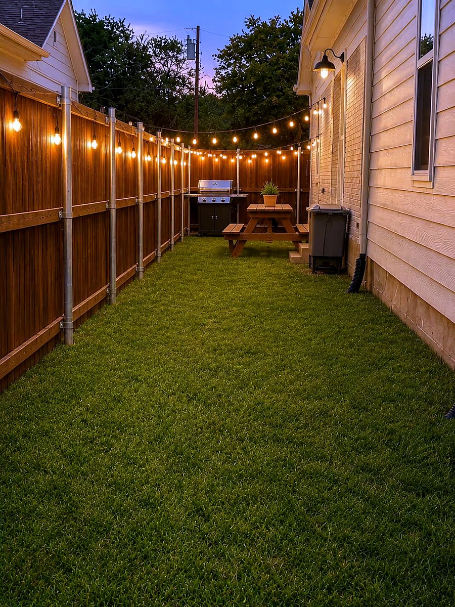 Private side yard with direct access to the kitchenperfect for morning coffee, outdoor dining, grilling, or letting your pup enjoy the fresh air in a fully fenced space.