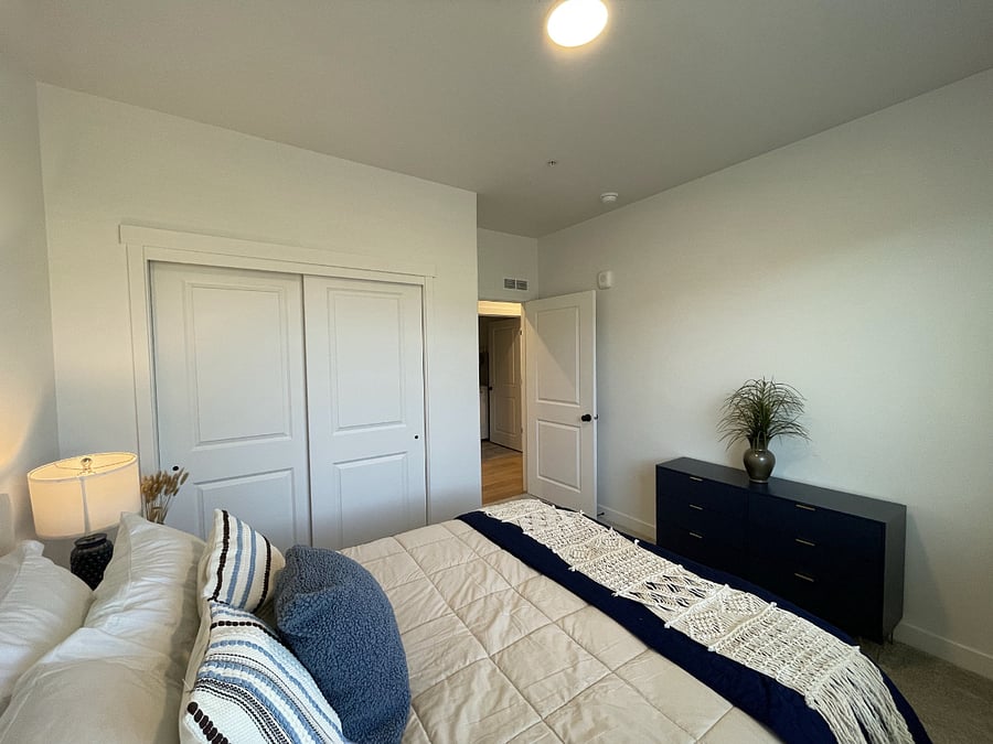 Bedroom two with a dresser.