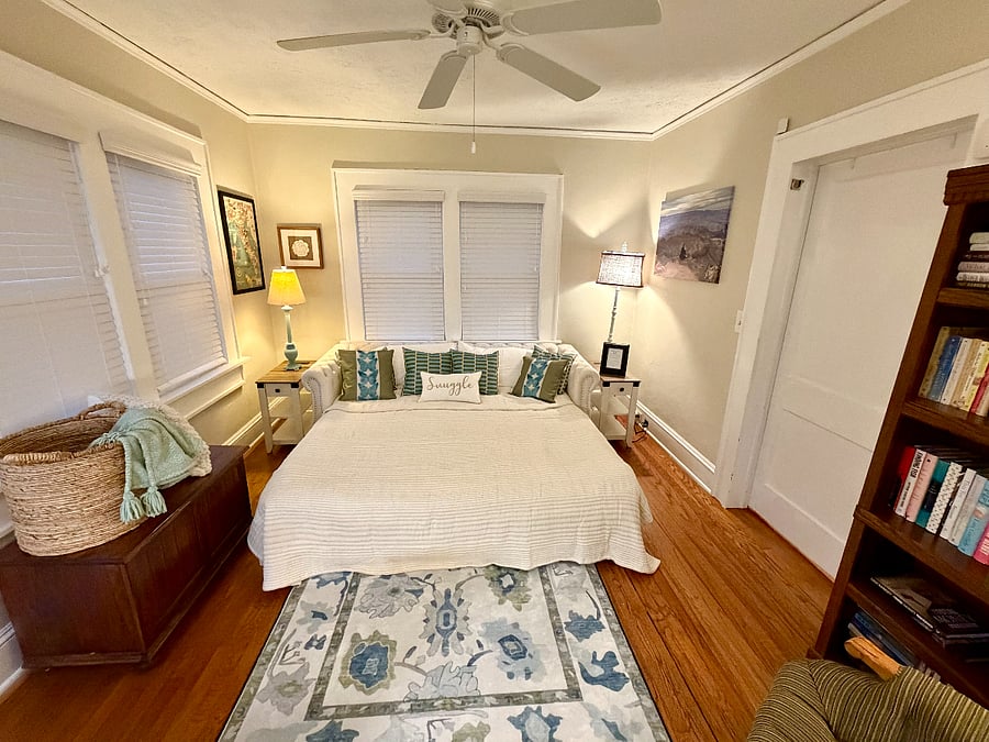 Sun room: King Bed converted from sofa