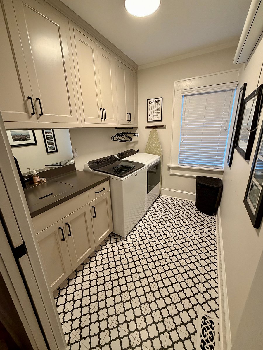 Convertible sink cover creates a larger work surface for folding and organizing