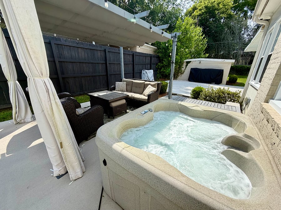 Hot tub professionally maintained throughout your stay. Area includes retractable privacy curtains for enhanced comfort and relaxation