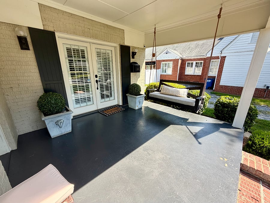 Start your morning with coffee or unwind in the evening on the covered front porch swing