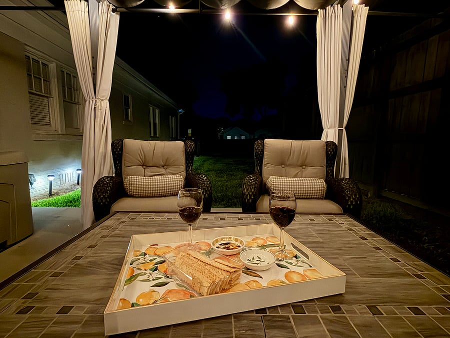 An evening retreat for wine, conversation, and quiet relaxation under the pergola