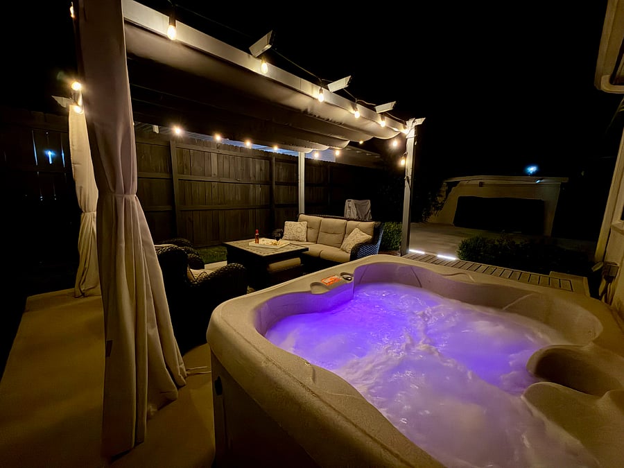 Soak beneath the lights in your private hot tub and enjoy a peaceful evening outdoors under the stars