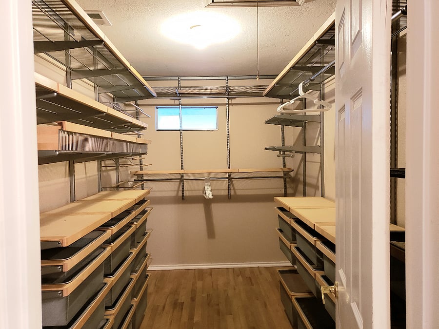 one of the two closets in the master bedroomup