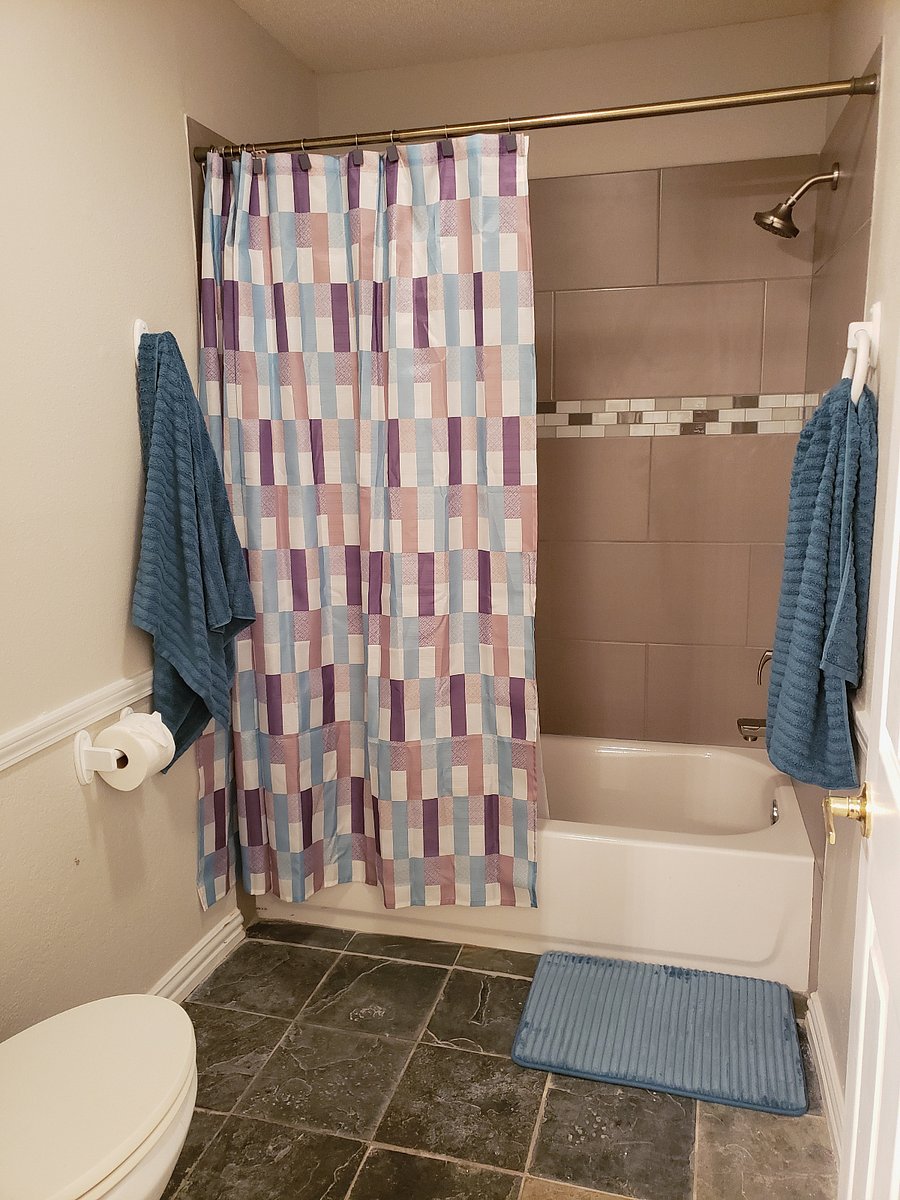 toilet and shower are in a separate room of master bath