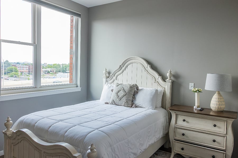Bedroom with electric shade 