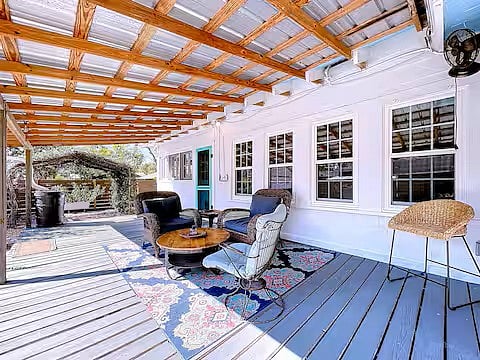 Back porch living and an outdoor gazebo shower to cool off on hot days.