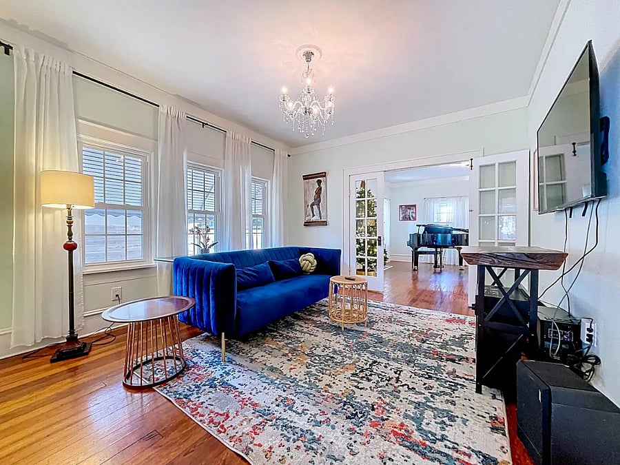 Comfy living space with Smart TV and quality sound system.