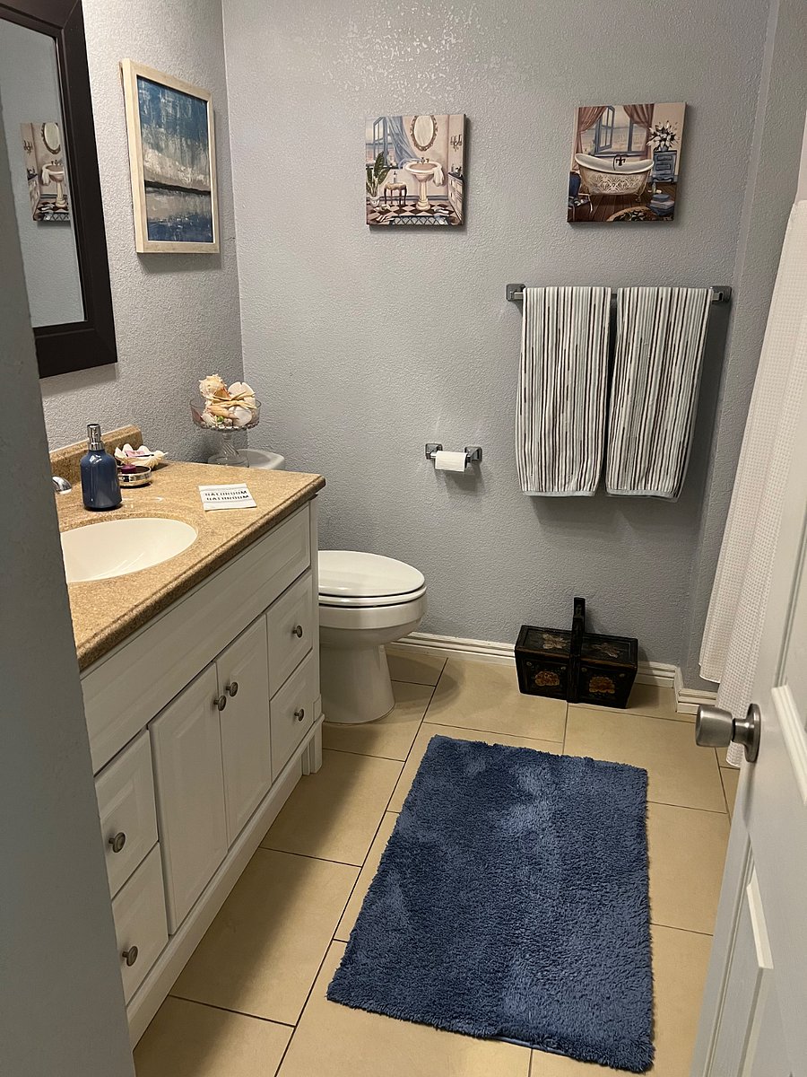 Dedicated bathroom primarily reserved for the tenant, offering comfort and privacy.