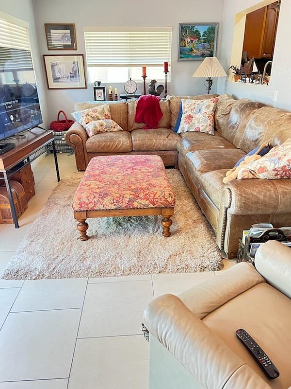 TV Room. Comfortable living area with leather seating and Smart TV--an inviting place to relax after work.