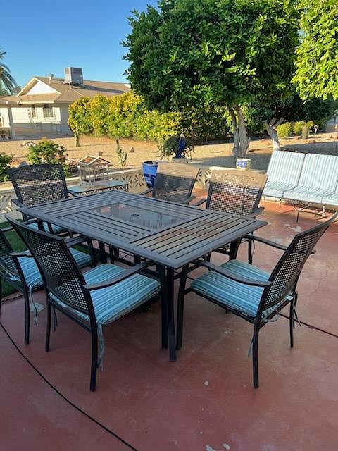 Bank Patio-Peaceful backyard patio with outdoor seating, perfect for enjoying Arizona evenings.