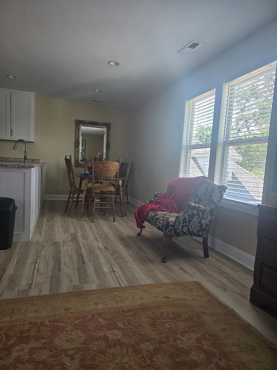 Dining corner with chairs.  Loveseat