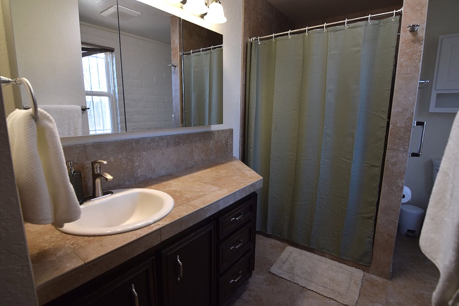 Primary Bathroom Featuring a Spacious Two-Person Shower and Additional Closet Space