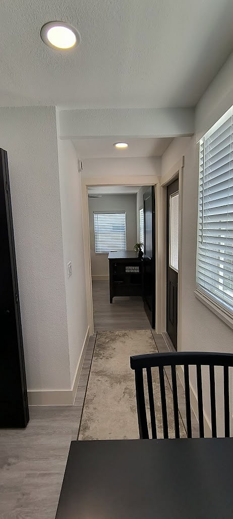 Hallway to primary bedroom