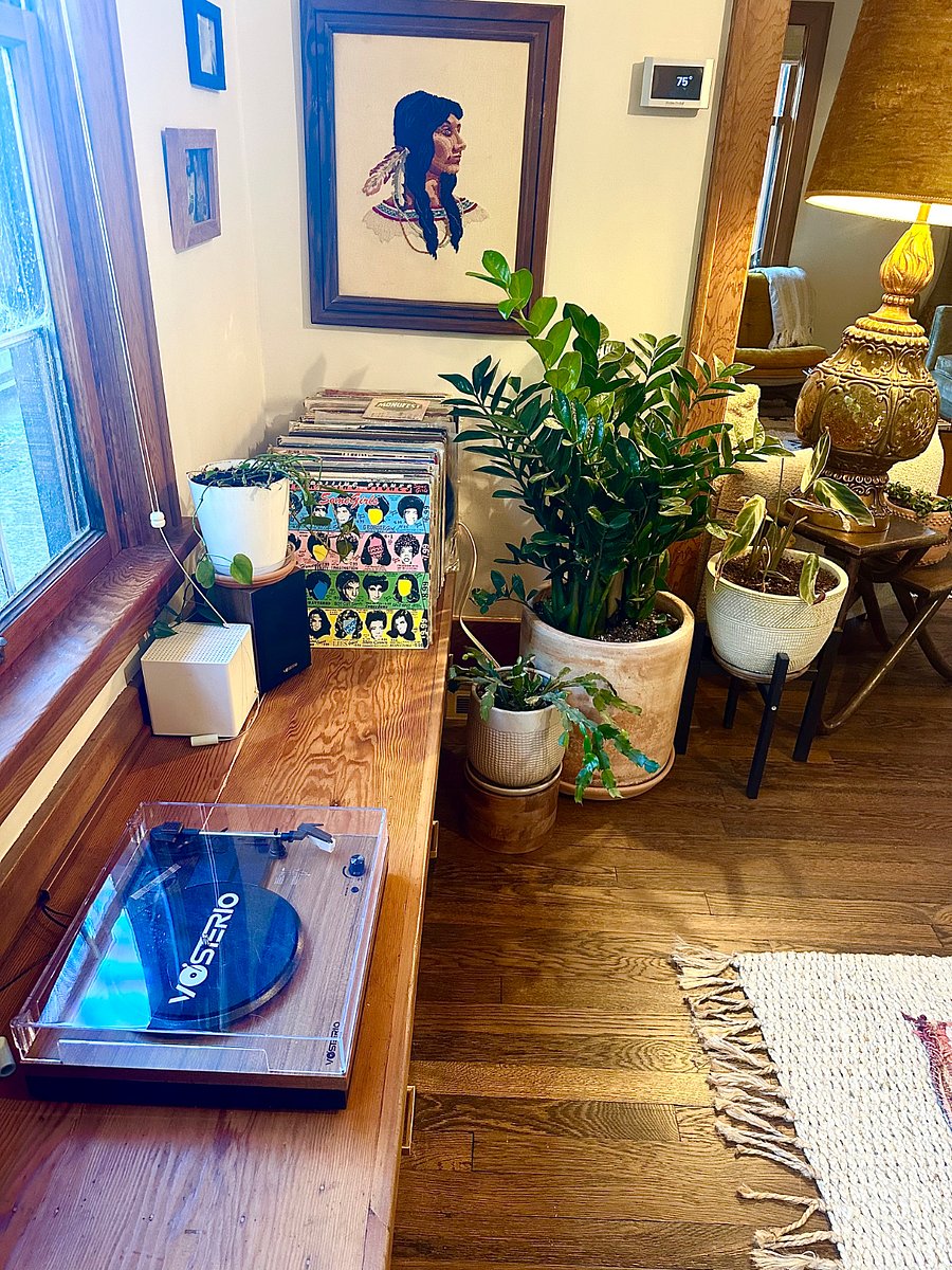 Record player with a vinyl catalog of 80's and classic rock music. Record player is also bluetooth so you can play your own music