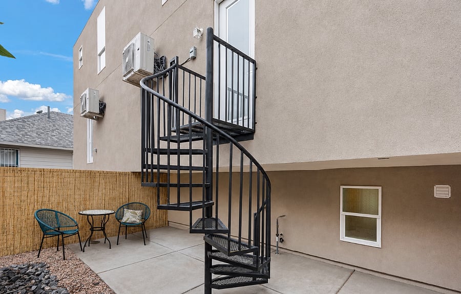 Backyard stairs: not featured is window iron bars and backdoor iron storm security door.