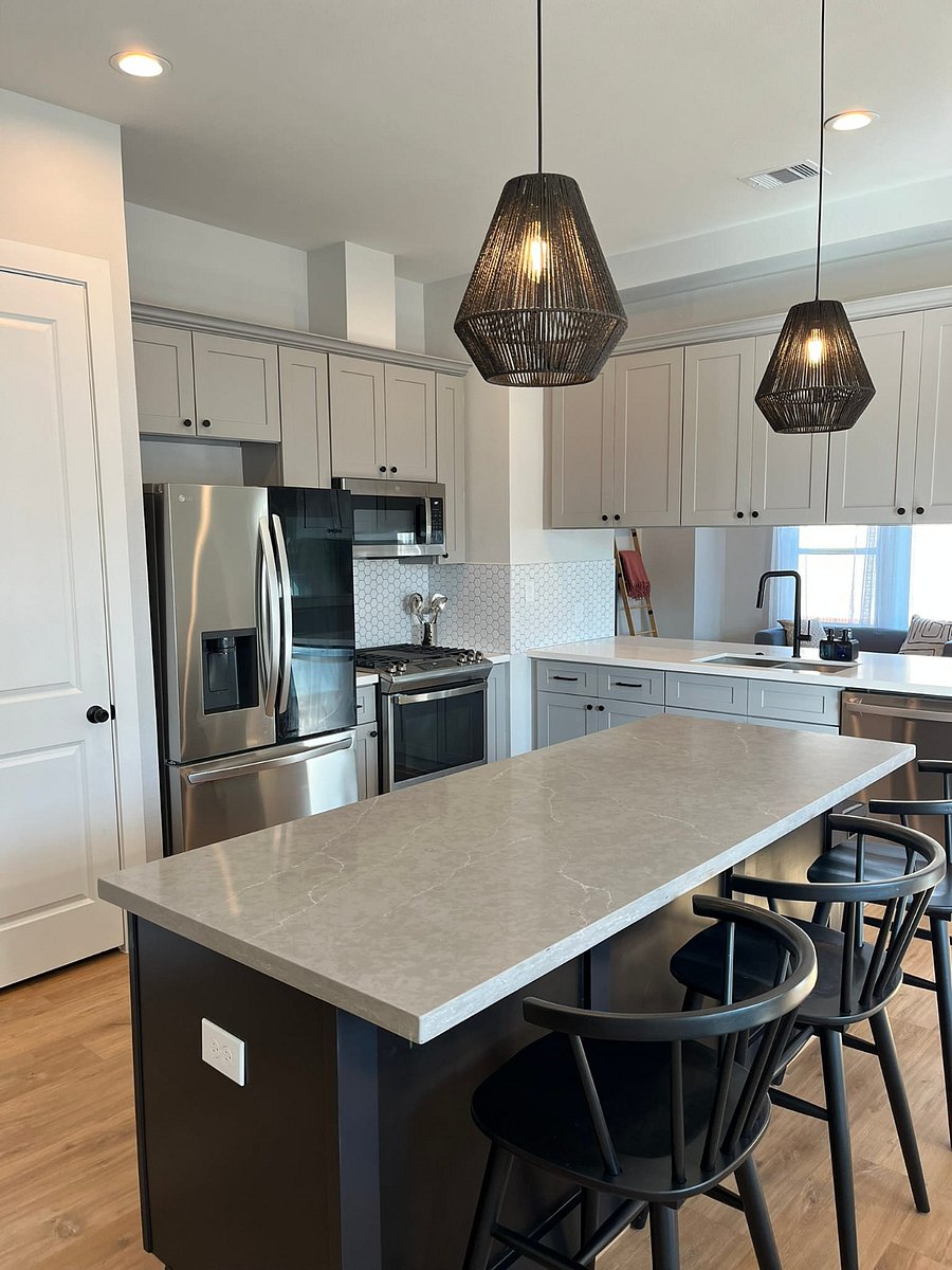 Kitchen Includes:  Large Fridge/Freezer, Microwave, Dishwasher, Oven + Large 5 Burner Stovetop