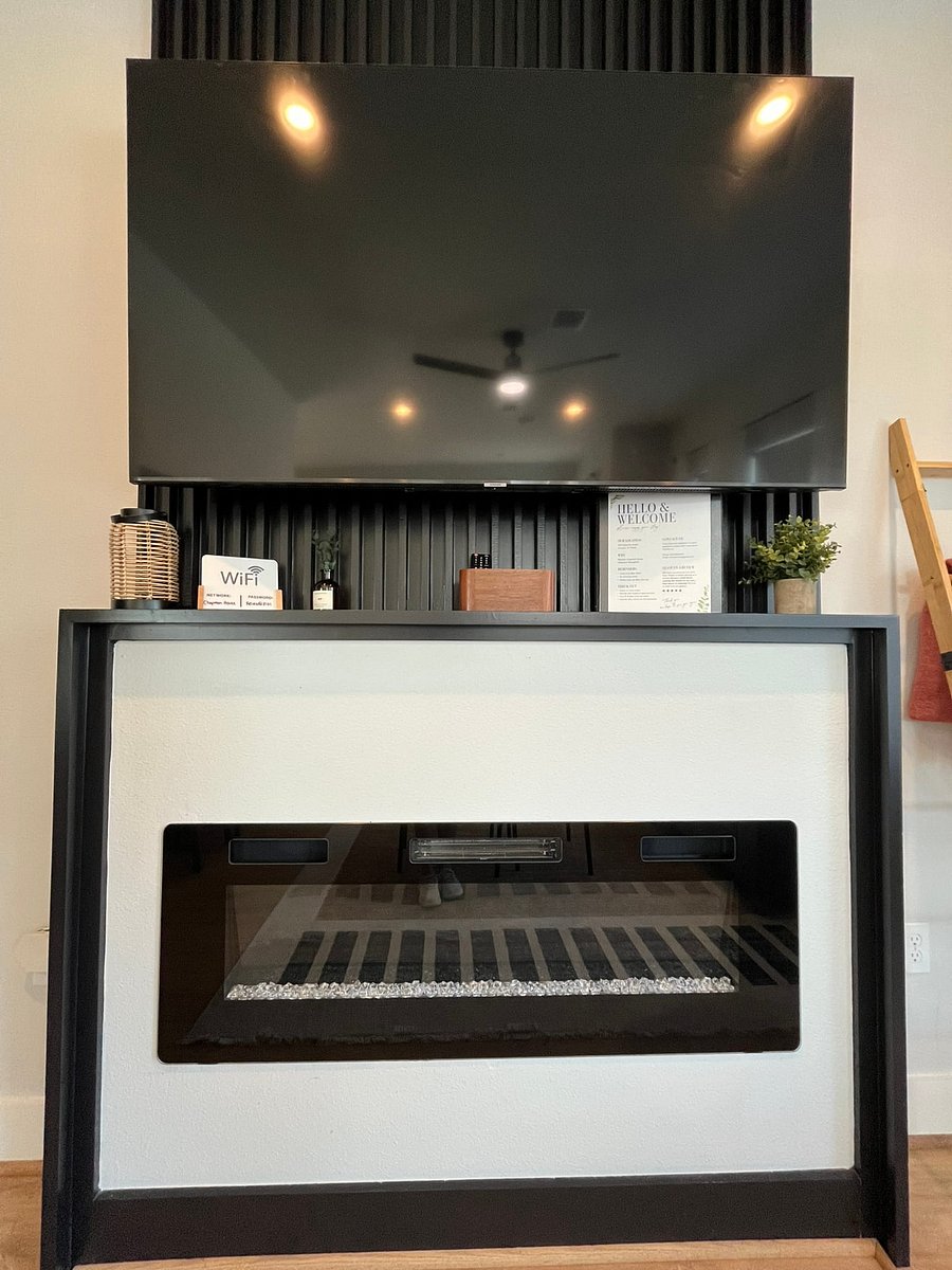 Living Room, Working Electric Fireplace. Smart TV, Wifi Included