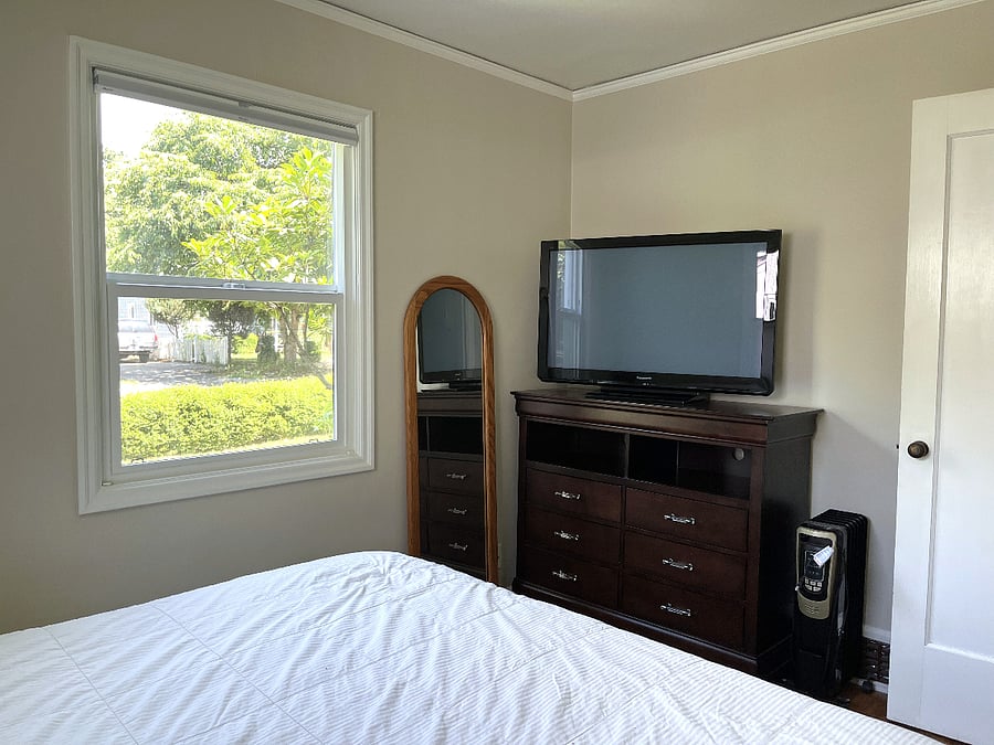 Bedroom 1 with TV.
