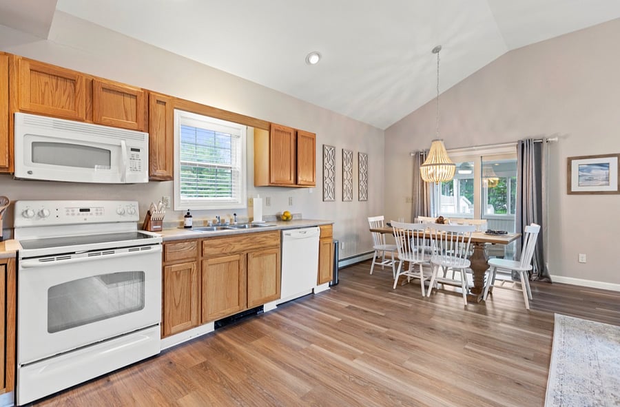 Please note: Since this photo was taken, the kitchen has been beautifully updated with white cabinets and brand-new stainless steel appliances.