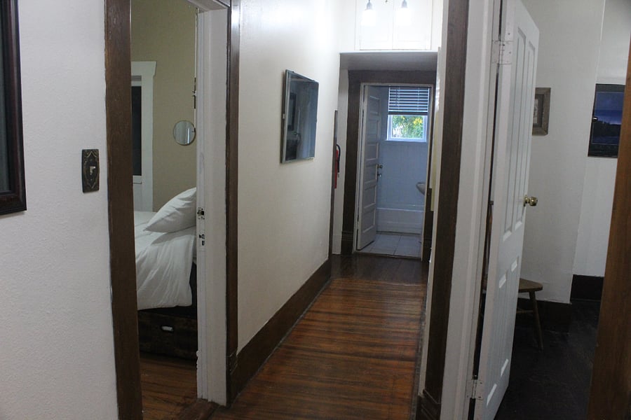 Hallway to shared bathroom.