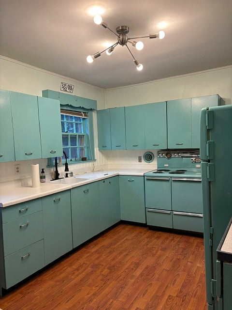 There is a cabinet in the kitchen for your groceries and an extra refrigerator in the basement.
