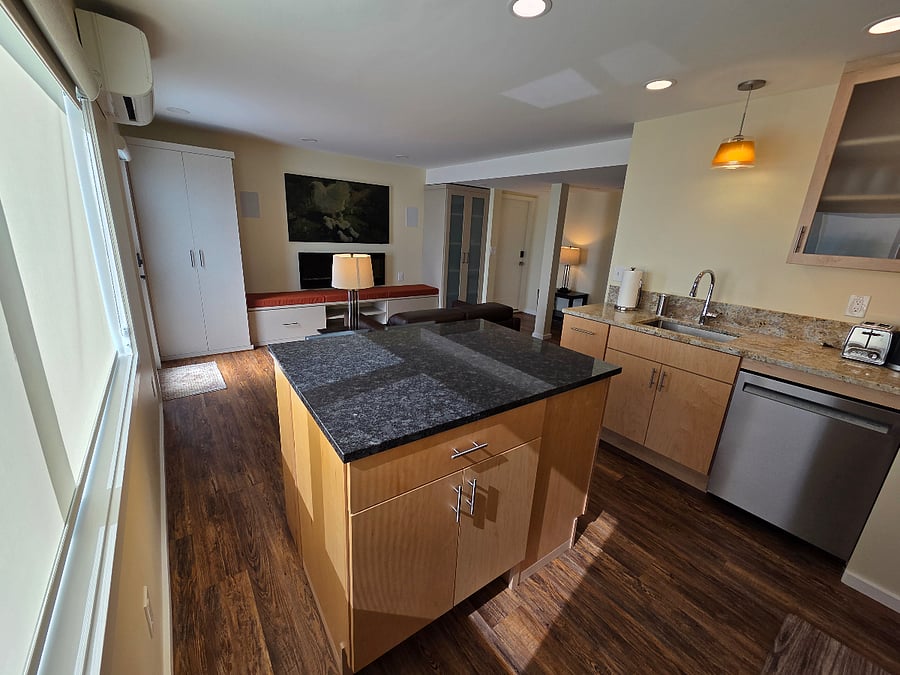 Large island includes seating for two and two bar stools.