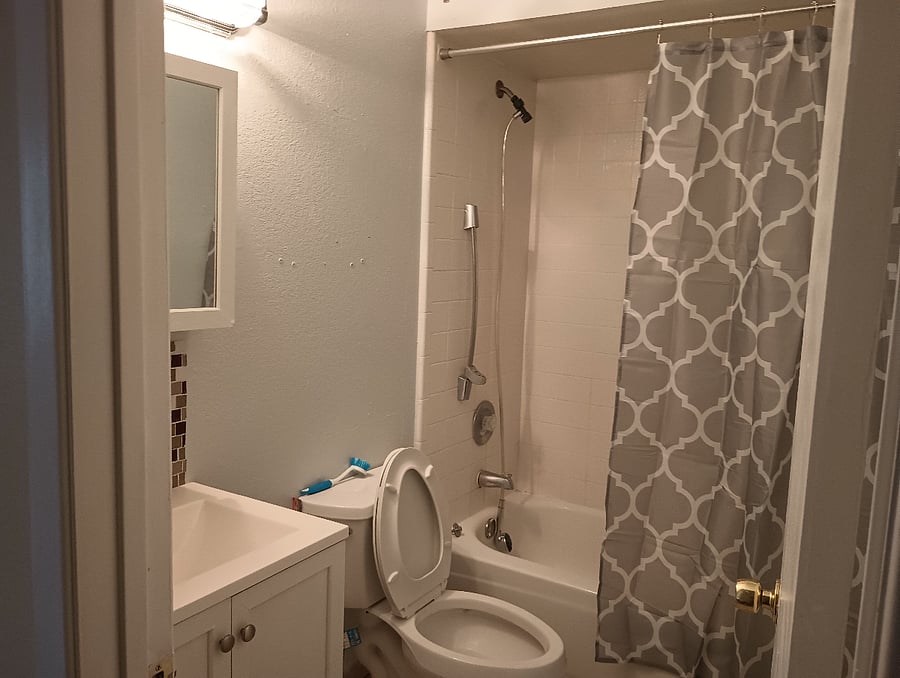 Shared bathroom in passage