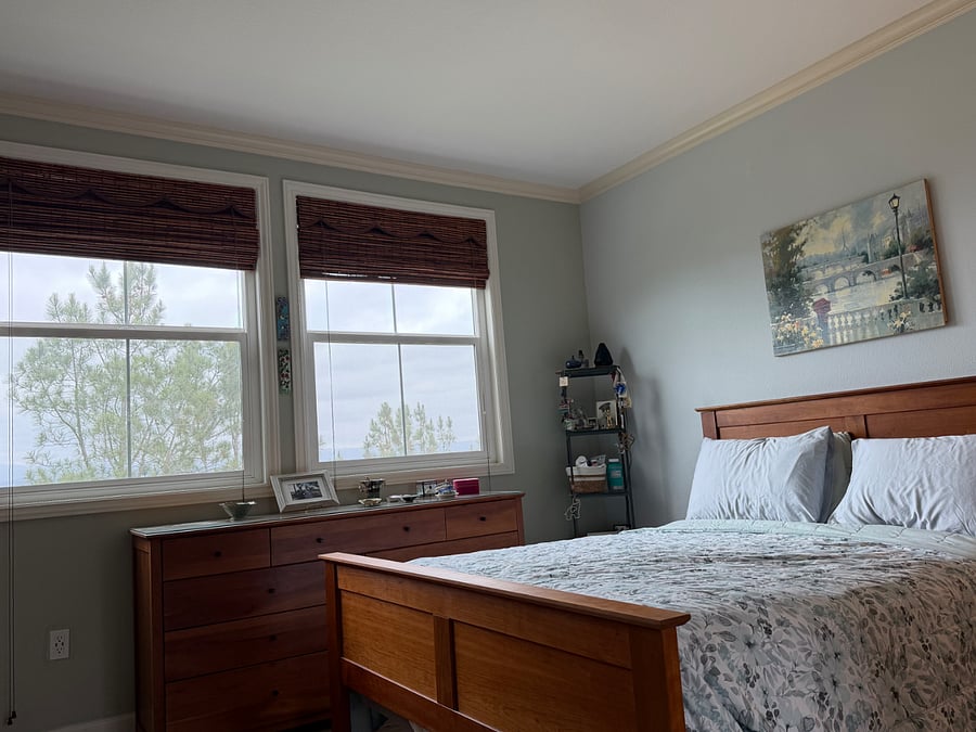 Queen primary suite with east-facing sunrise and valley views.