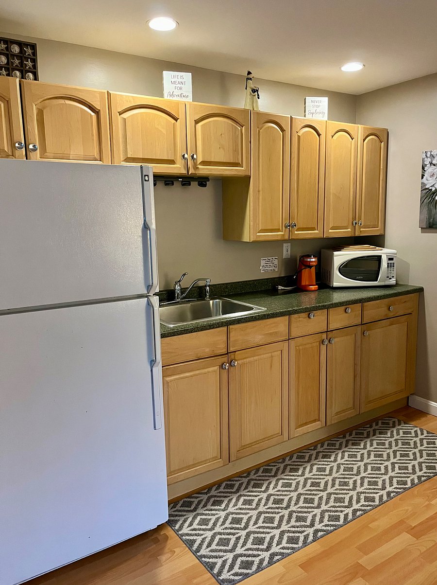Private kitchen with 2 burner hot plate for cooking and cooking essentials .