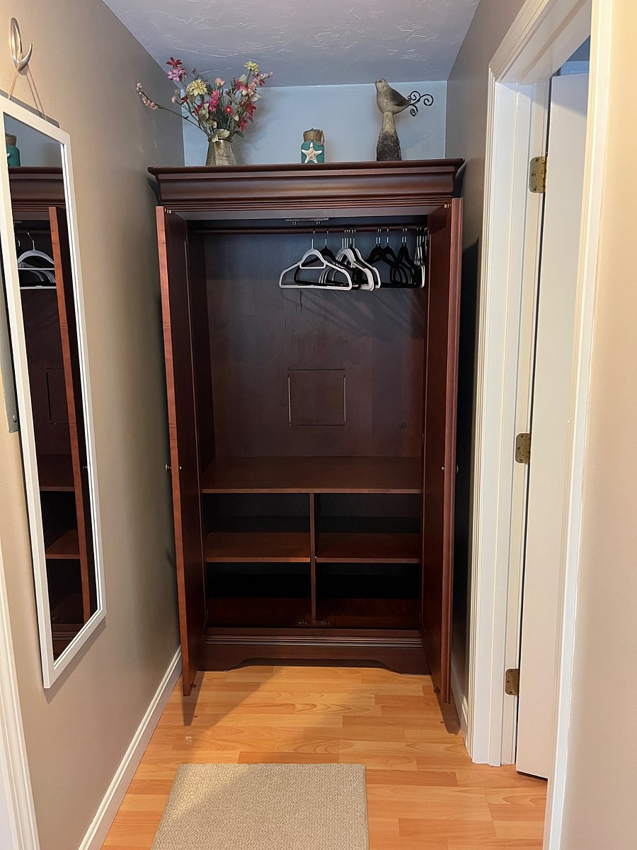 This armoire would be used for all of your hanging and folded clothing.
There is no chest of drawers in the unit.