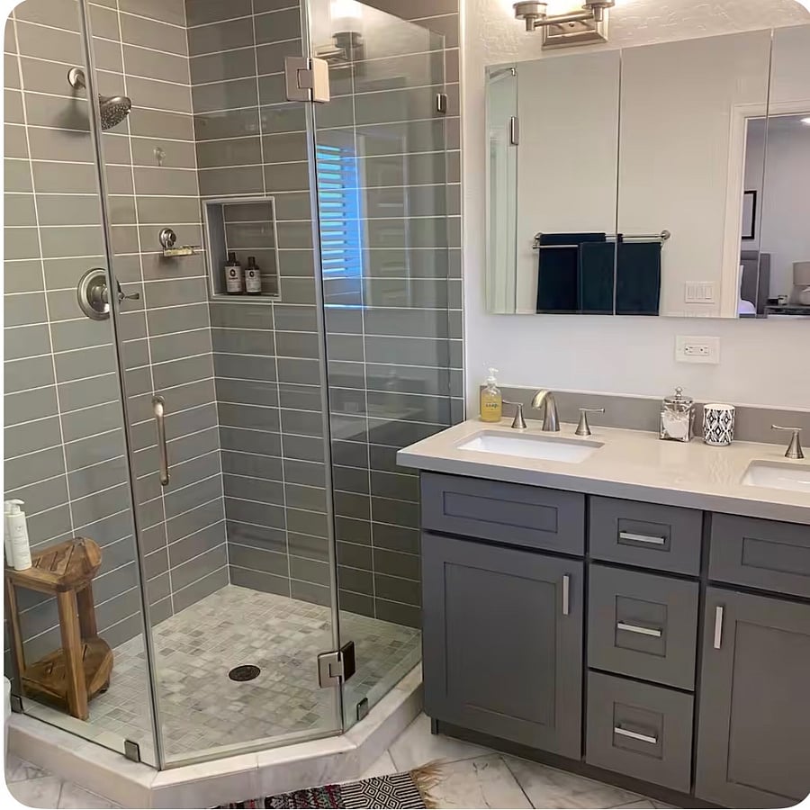 Primary bathroom with two sinks, walki-in shower