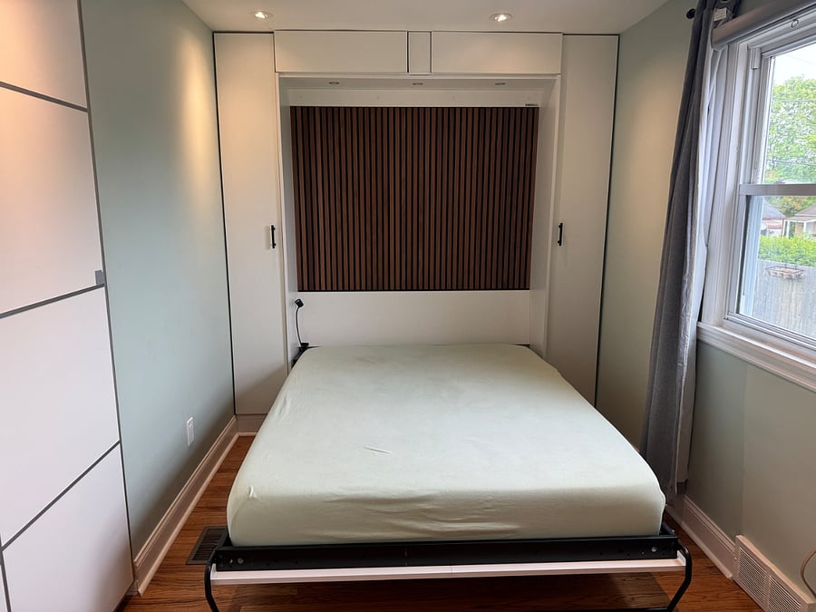 Bedroom one with desk on the back of the Murphy bed. 