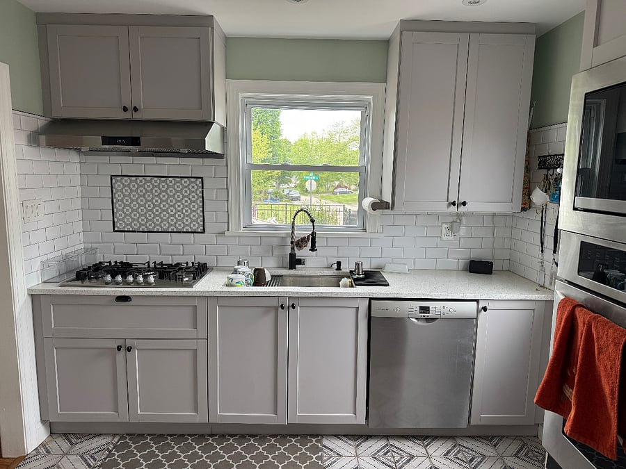 Kitchen - gas range - spice storage underneath - range hood is very powerful and vents outside - tall cabinets for lots of dish and pantry storage space 
