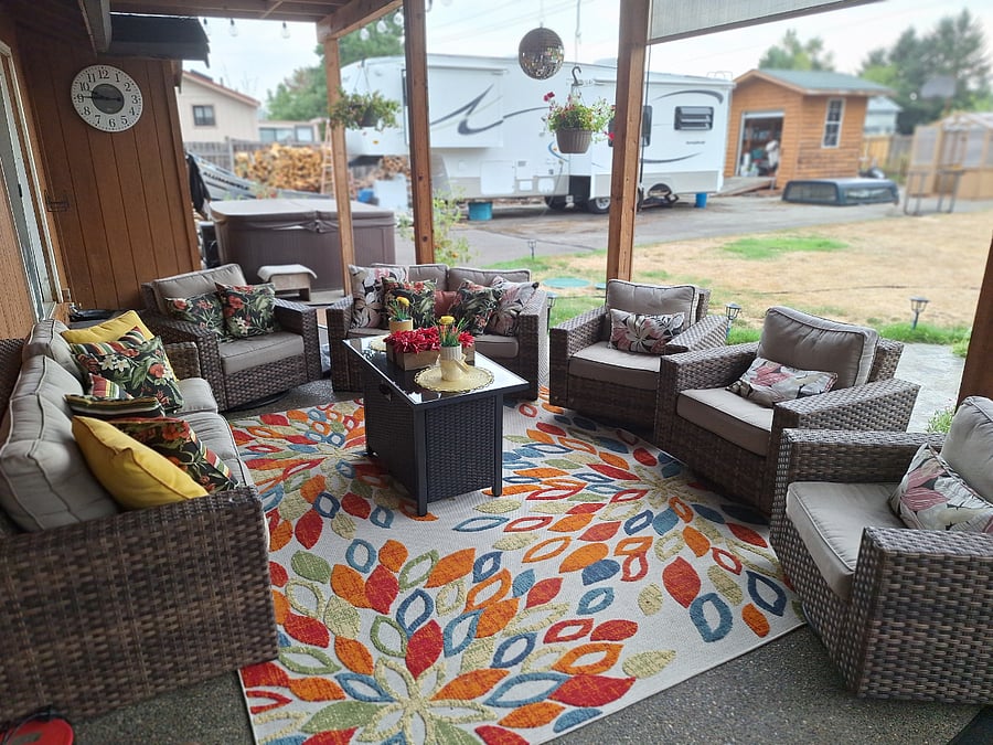 outdoor covered gathering spot with gas fire