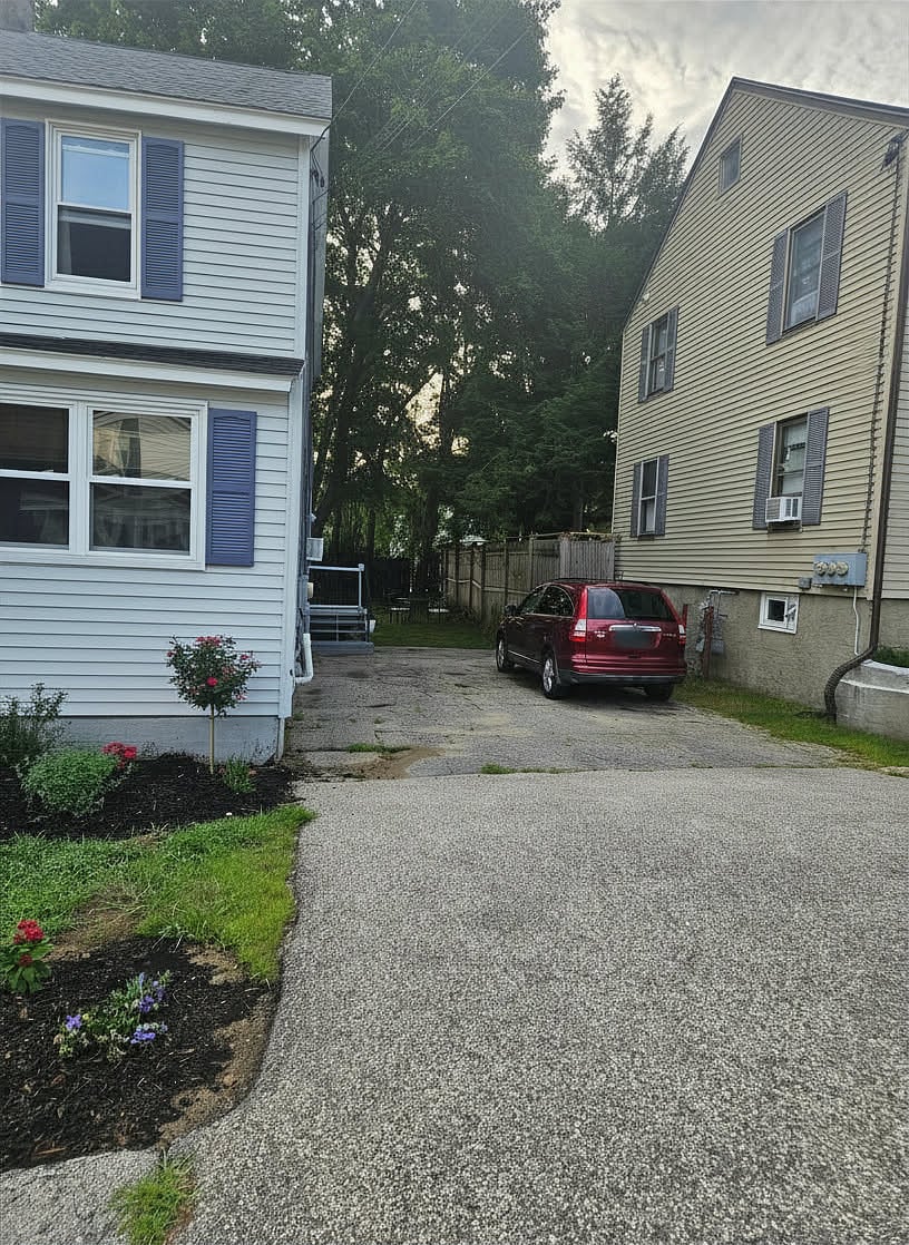 Off street parking available on the left for the first floor. Fits 2 to 3 cars