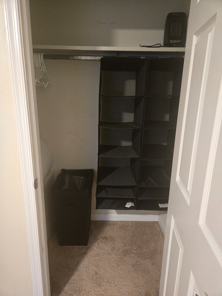 bedroom closet with storage on left side (not pictured)
