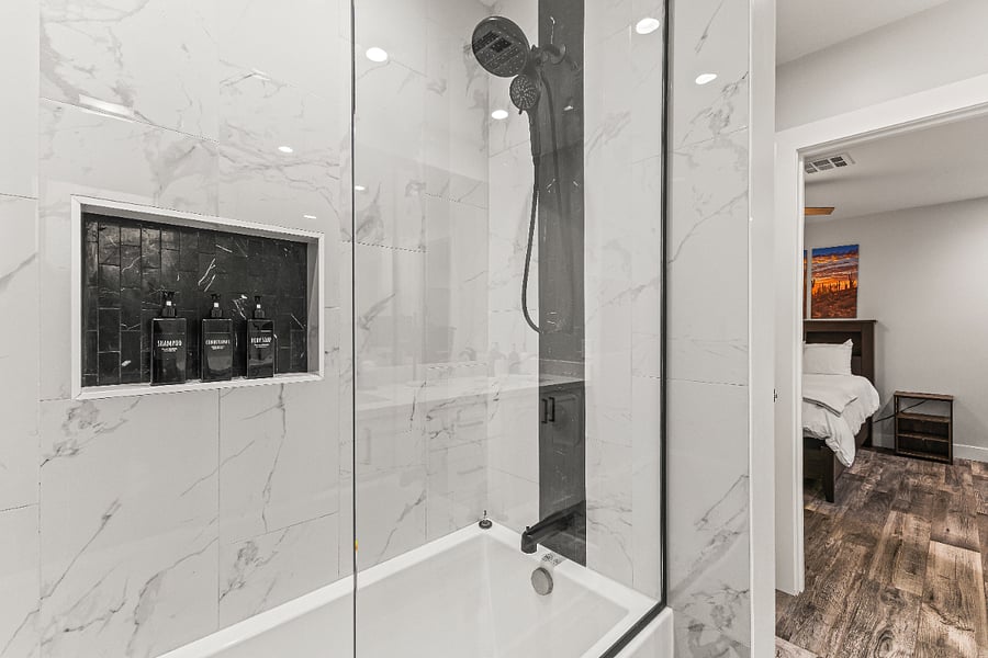 Bathroom 2. large rain-type showerhead with additional handheld wand. Large and deep soaking tub