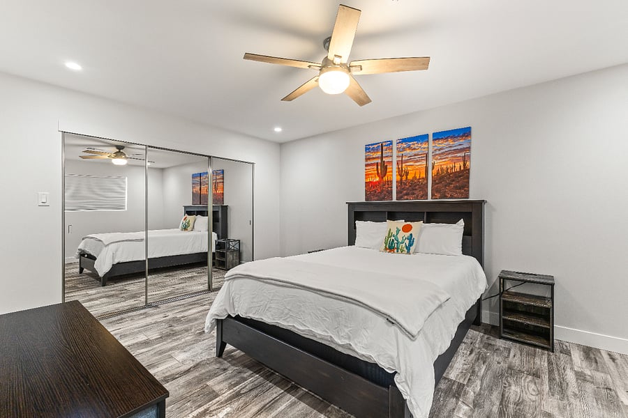 Bedroom 3, attached to Bathroom 2. Queen bed, 55" smart TV. Blackout shades