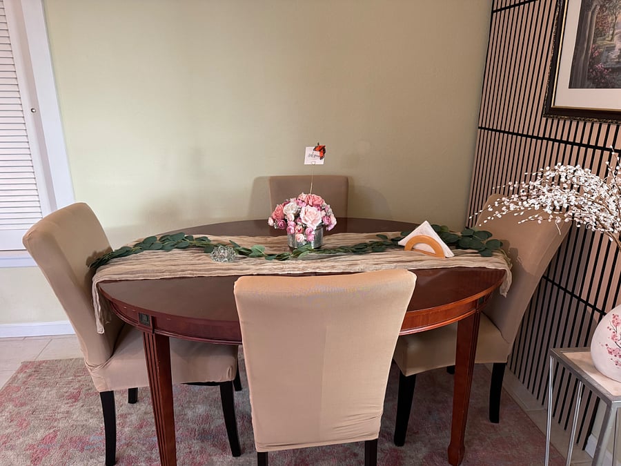 Dining area with a dining table and four chairs, perfect for enjoying meals