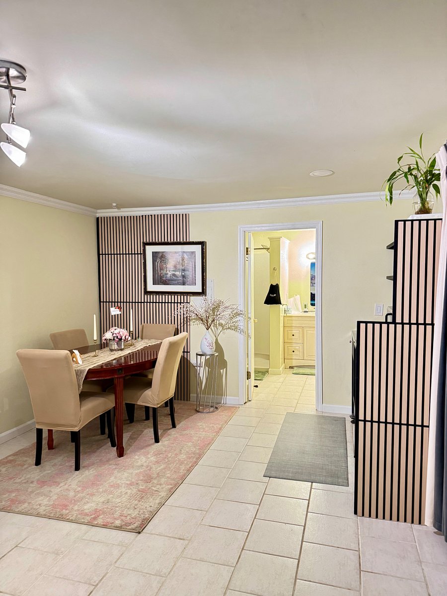 Dining area with a dining table and four chairs, perfect for enjoying meals