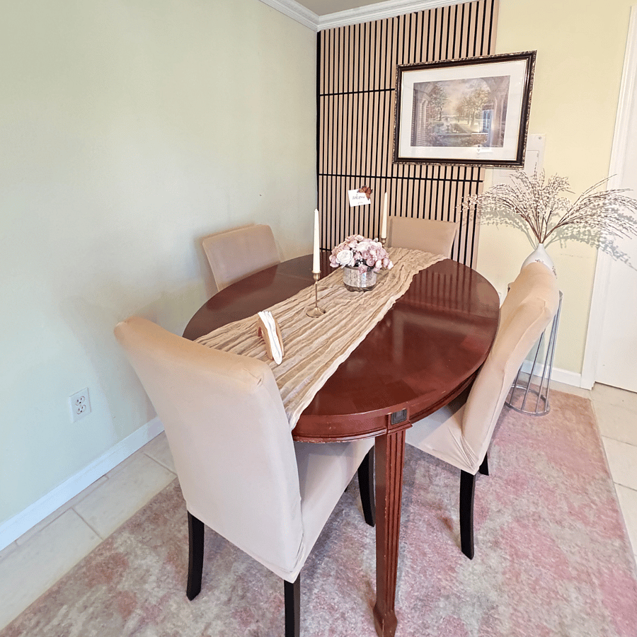 Dining area with a dining table and four chairs, perfect for enjoying meals