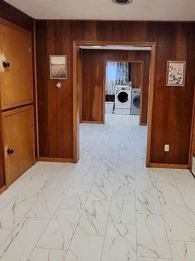 Shared laundry room with coin laundry adjacent to this unit.