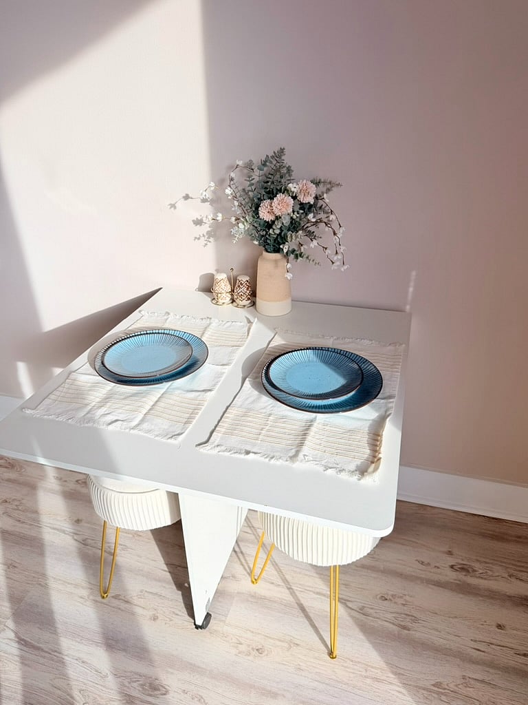 Table can be expanded to double in length as needed- serving as a workstation or extended dining area.